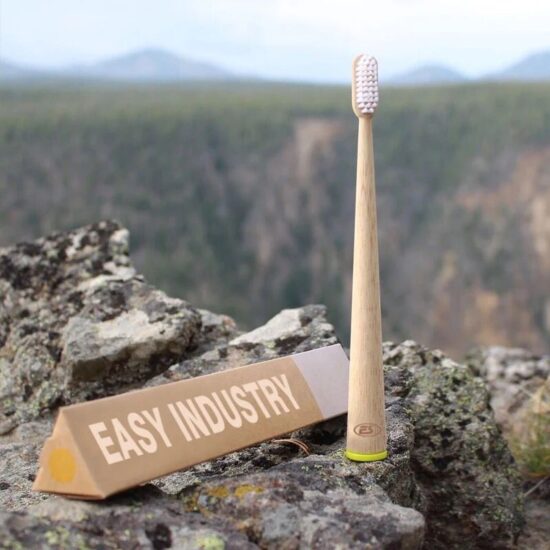 Charcoal bamboo toothbrush with rounded handle and DuPont nylon bristles