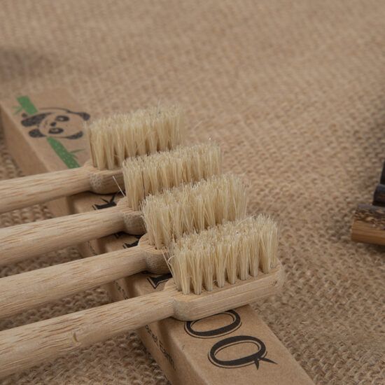 Bamboo and wood toothbrush with large tapered tail and natural boar and horse hair bristles