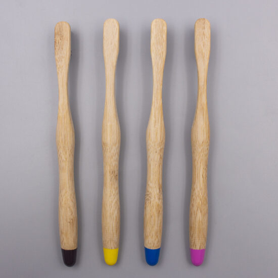 Custom biodegradable bamboo toothbrush with soft bristles and cylindrical bamboo handle for adults