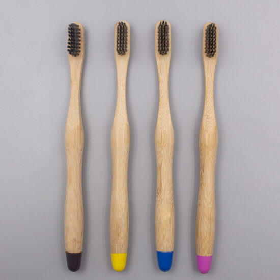 Custom biodegradable bamboo toothbrush with soft bristles and cylindrical bamboo handle for adults