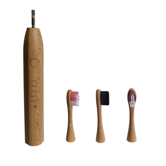 Bamboo electric toothbrush with biodegradable replaceable bamboo heads