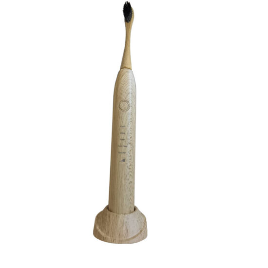 Bamboo electric toothbrush with biodegradable replaceable bamboo heads