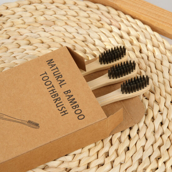 Minimalist bamboo toothbrush with soft bristles and square flat handle

