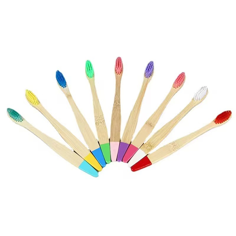 Children’s bamboo toothbrush with painted flat handle and soft nylon bristles