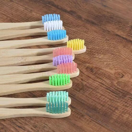 Children’s bamboo toothbrush with painted flat handle and soft nylon bristles