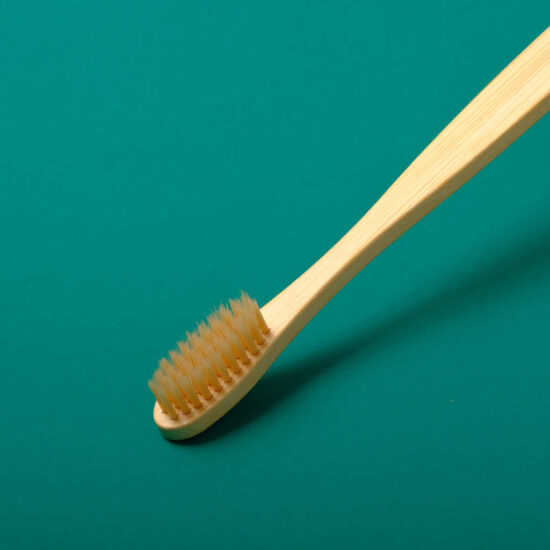  Natural bamboo hotel toothbrush with polished tapered nylon bristles