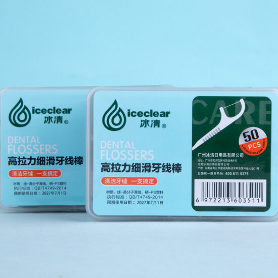 Curved bamboo charcoal dental floss picks for effective interdental cleaning, disposable and boxed for family use