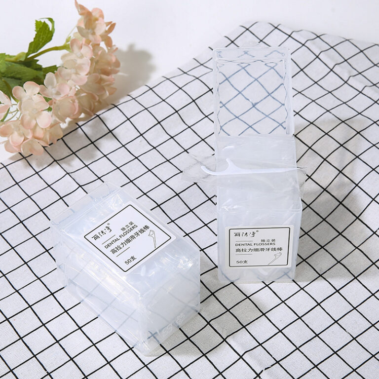 Premium individually wrapped mint charcoal dental floss picks in a 50pcs elegant box, ideal for wholesale