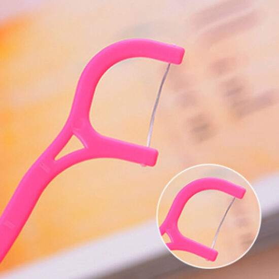 Plastic bag packed disposable dental floss picks for oral hygiene and interdental cleaning