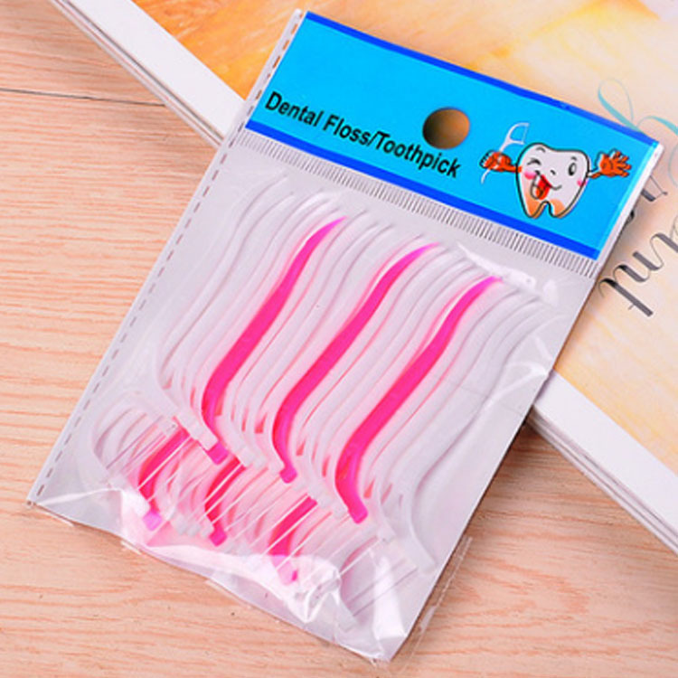 Plastic bag packed disposable dental floss picks for oral hygiene and interdental cleaning