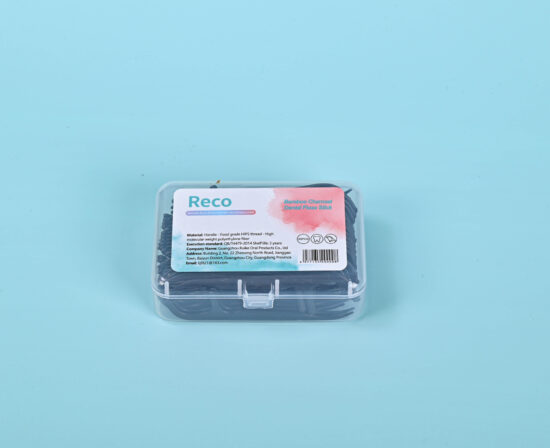 Bamboo charcoal floss picks for oral hygiene in plastic box packaging