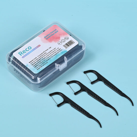 Bamboo charcoal floss picks for oral hygiene in plastic box packaging