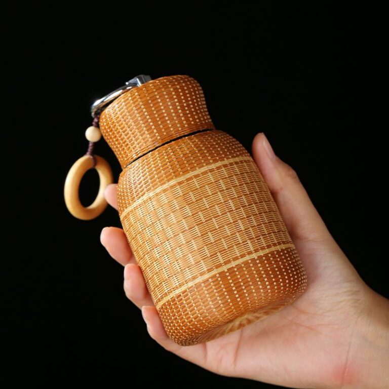 Handmade bamboo travel mug with stainless steel liner and thermal insulation