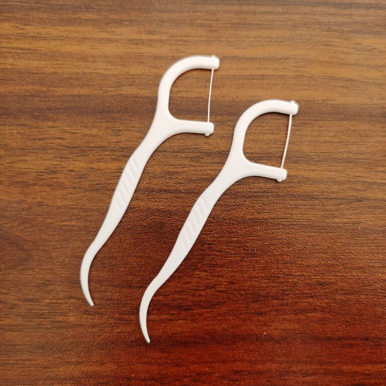 Boxed disposable dental floss picks with high tensile strength and gum-friendly tips