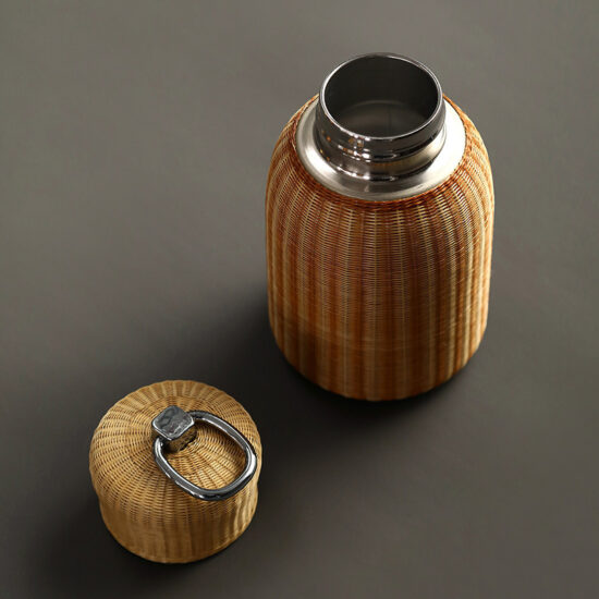 Porcelain bamboo-woven insulated tea cup with lid and stainless steel liner