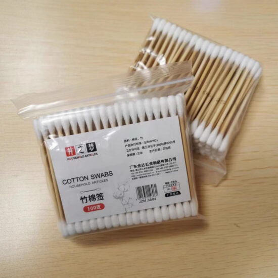 Double-ended bamboo cotton swabs with pointed and round tips in round plastic container